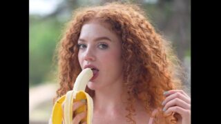 Curly Redhead OnlyFans Model @lilredzoe Eating a Banana – Captivating Footage